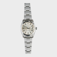 Silver wristwatch with a detailed face on a white background